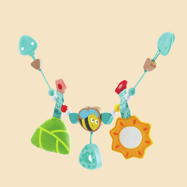 Gioco per carrozzina con sonaglio Gioco per carrozzina con sonaglio