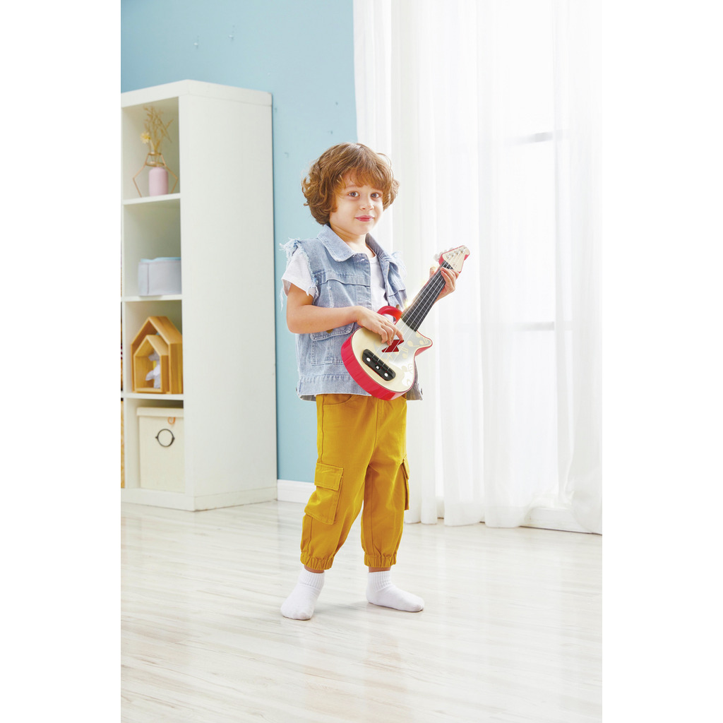 Ukulele rosso a ritmo di luci Ukulele rosso a ritmo di luci